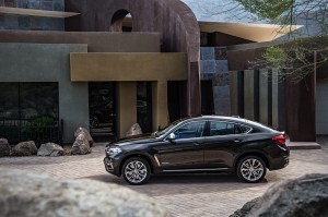 Фото  BMW X6 второго поколения 2014 г.  общий вид сбоку